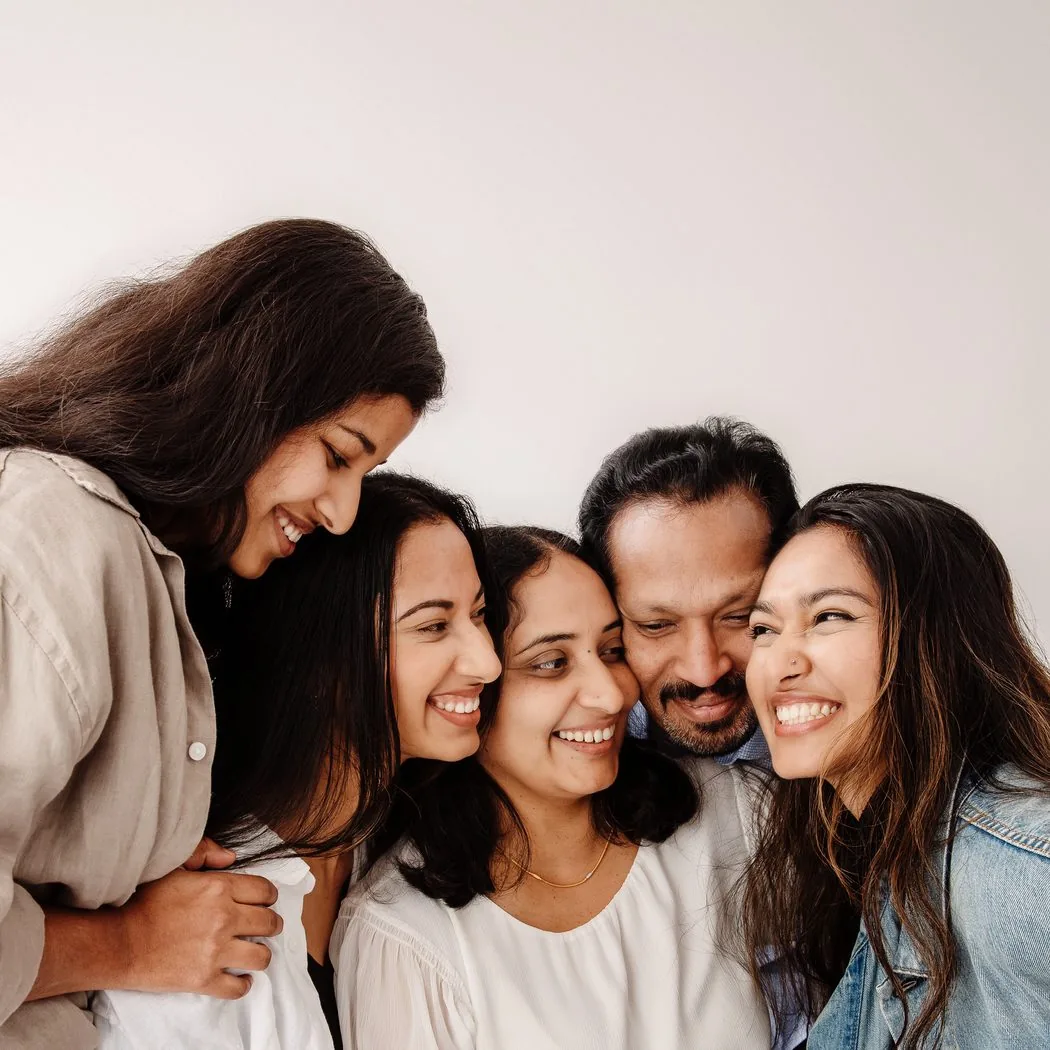 A father and his daughters, Verve studio portrait